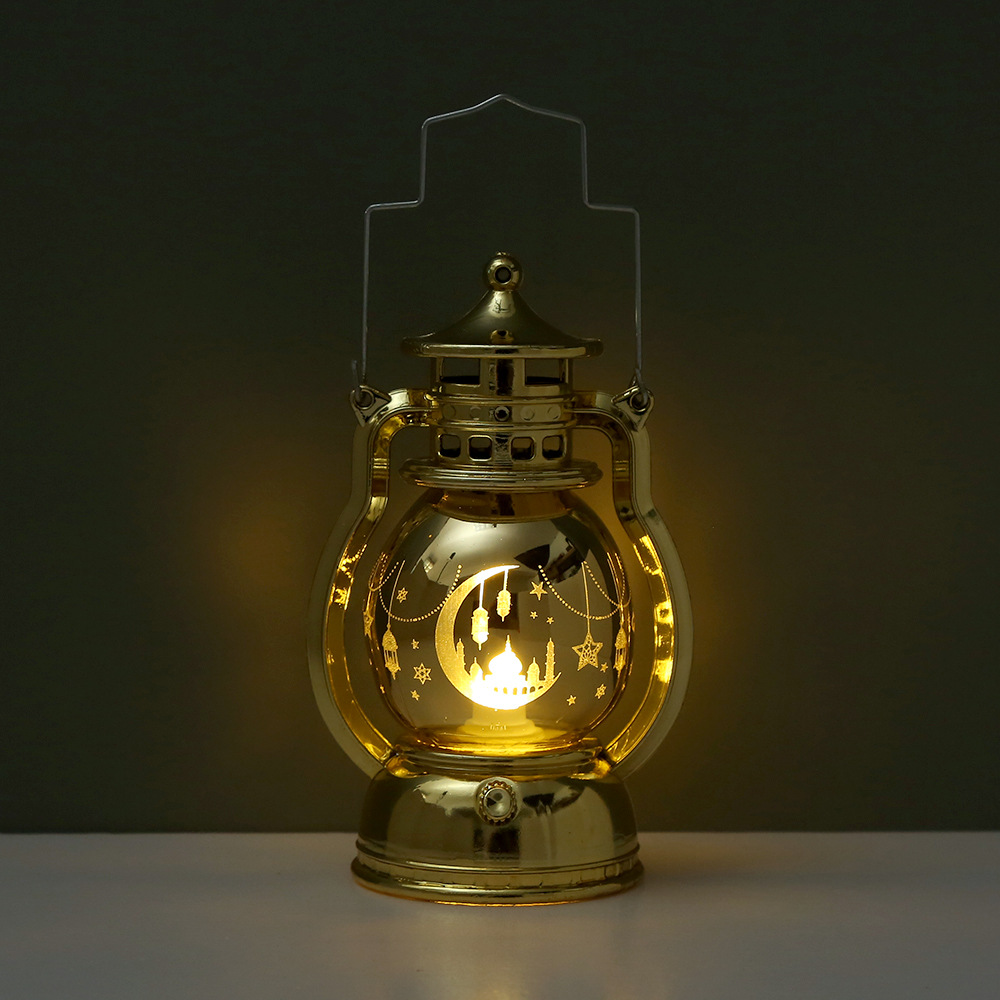 Four retro oil lamp lanterns placed on white desktop with book background