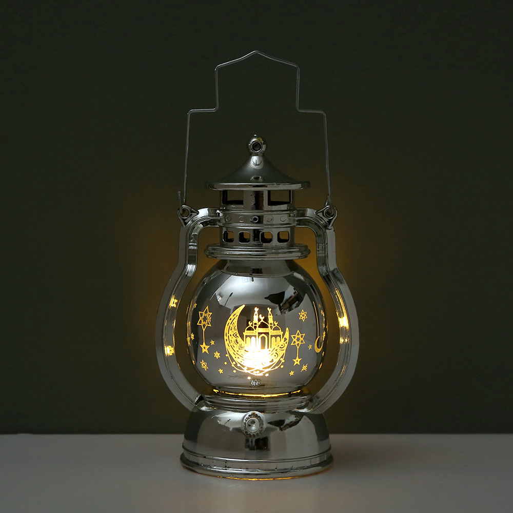 Close-up transparent glass inner etched luminous Islamic pattern and metal lifting handle