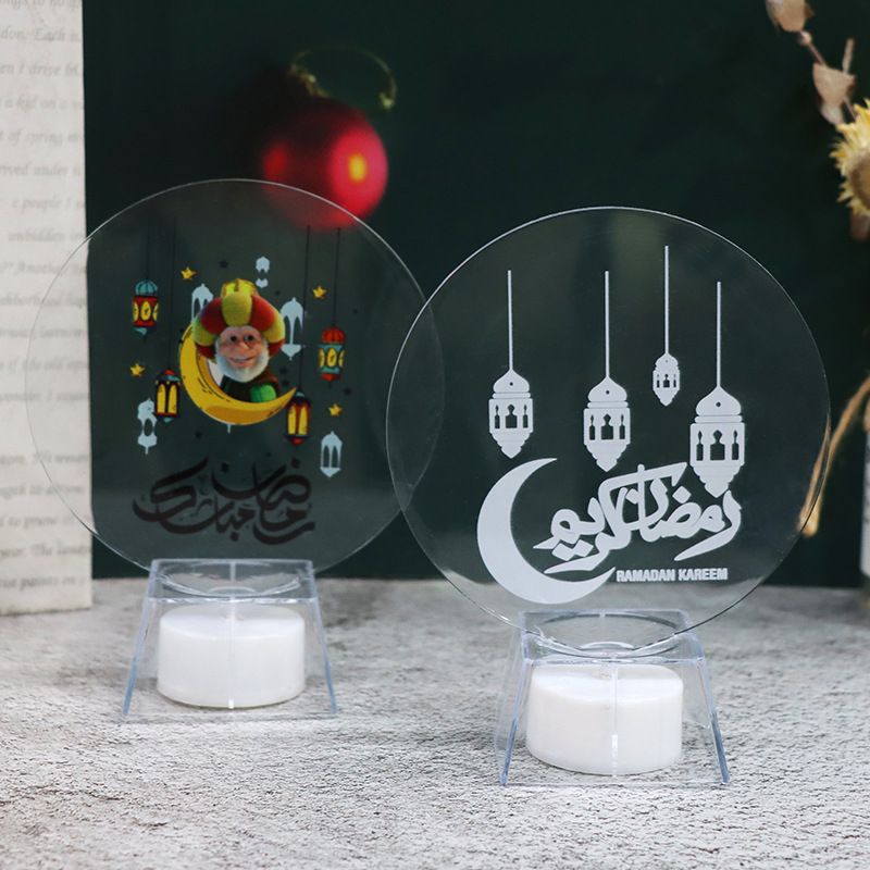 Acrylic ramadan night lights placed on wooden table brick wall background