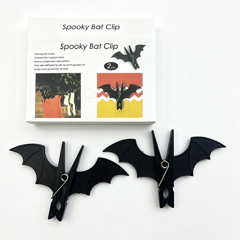 bat clips hanging polaroid photos goth bedroom wall display