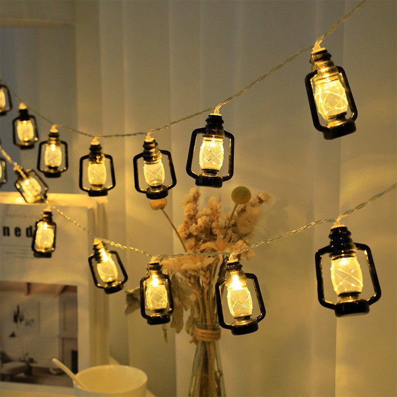 Close-up of hollow moon star mosque lantern pendants on light string