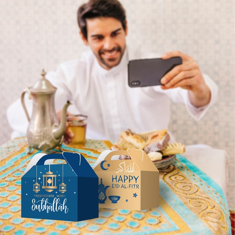 Close-up of mosque, lantern and arabic print on eid party favor boxes