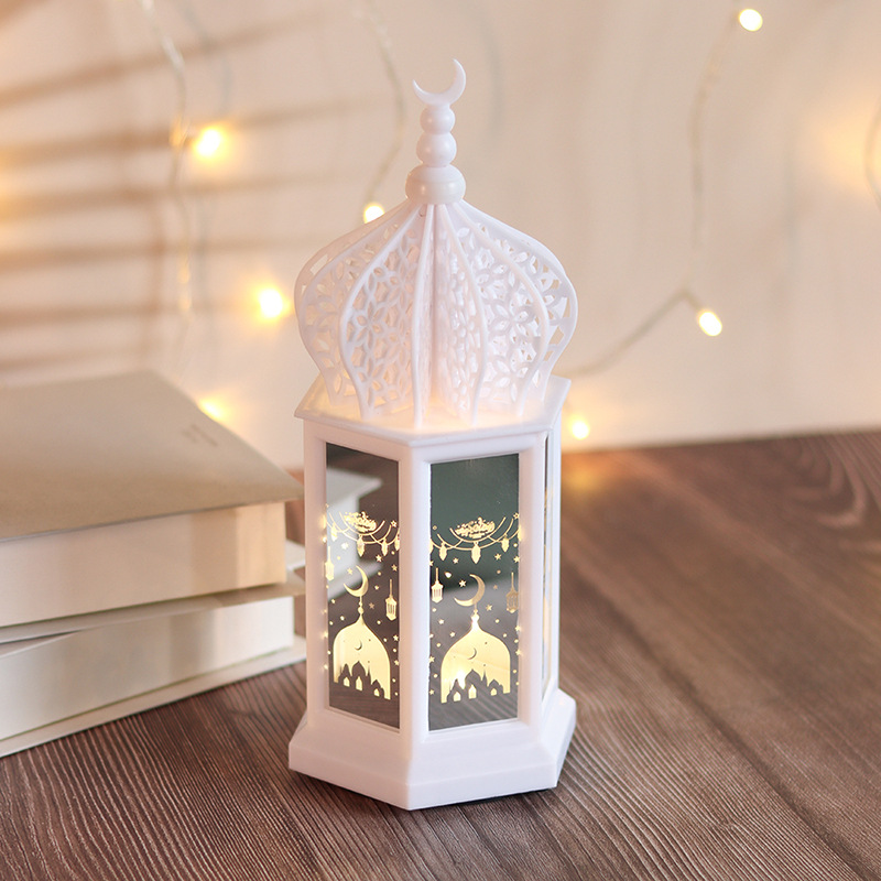 Pure white hollow dome crescent ramadan led table lantern warm light shot on wooden table