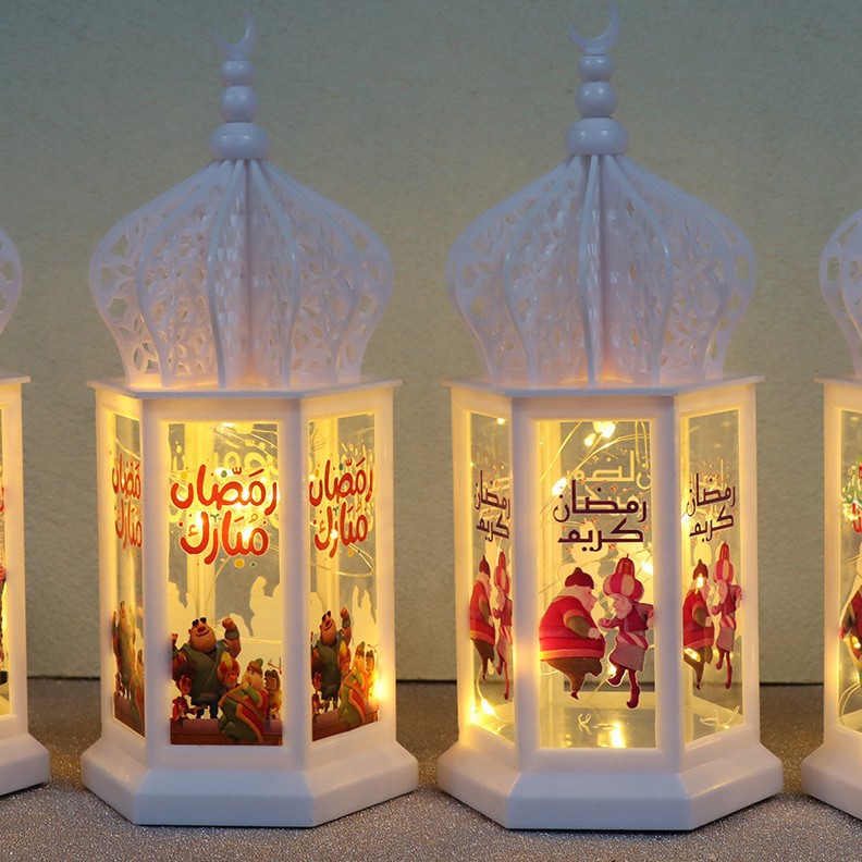 Close-up transparent panel arabic ramadan text and inner fairy string lights luminous effect