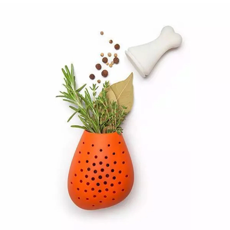 drumstick herb infuser placed inside cooking soup pot kitchen display