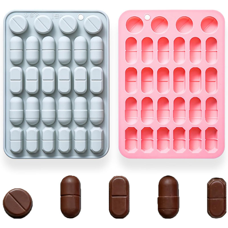 gray and pink pill capsule tablet food grade silicone mold white background product shot