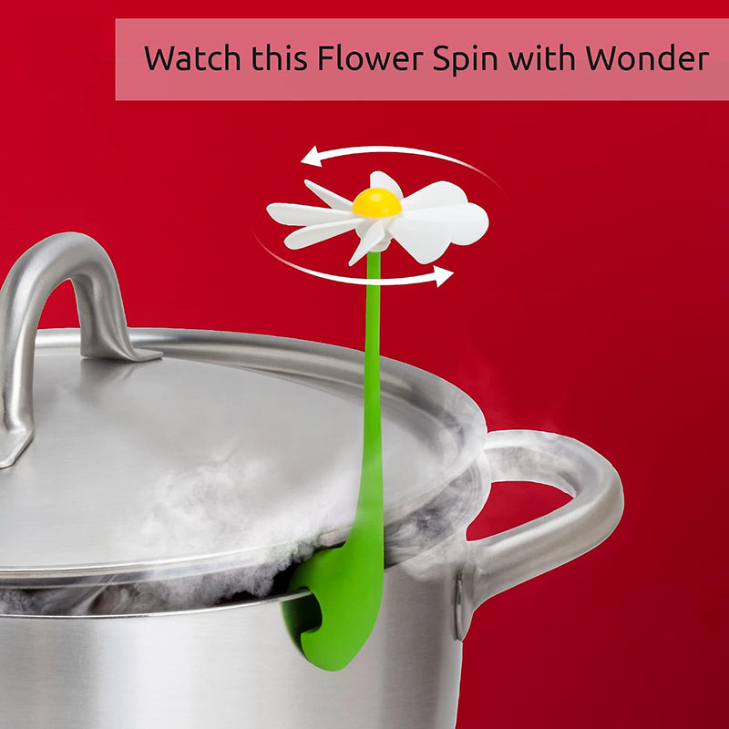daisy steam releaser clipped on cooking pot kitchen stovetop display