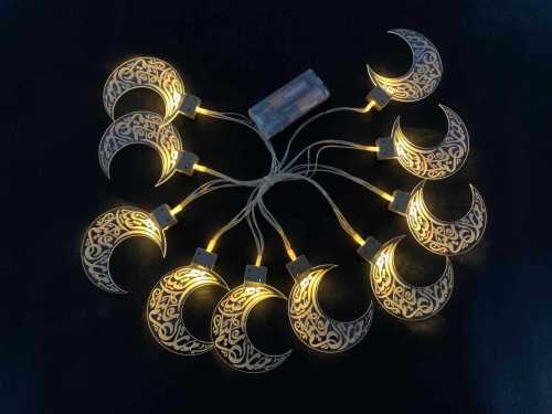 Ramadan fairy lights hanging on home window eid holiday decoration