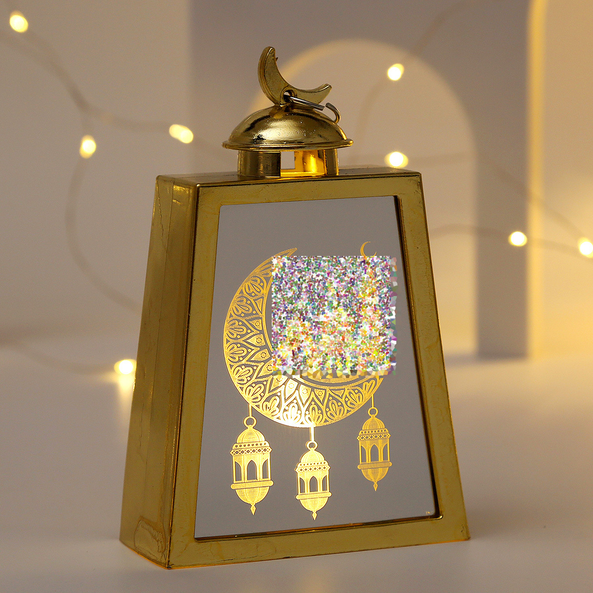 Close-up glitter mosque pattern panel and top crescent ornament luminous shot