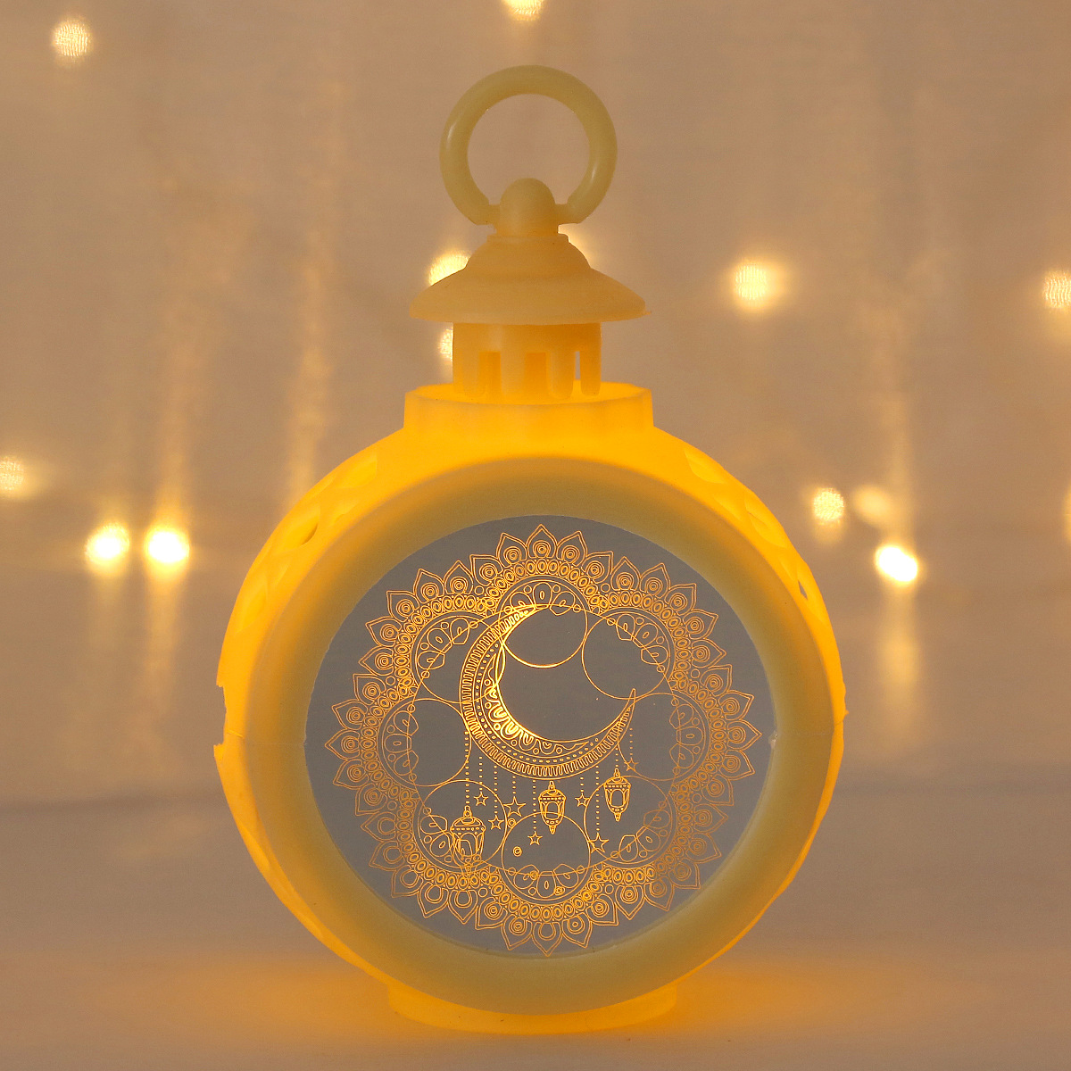 Close-up transparent panel golden mosque crescent luminous pattern