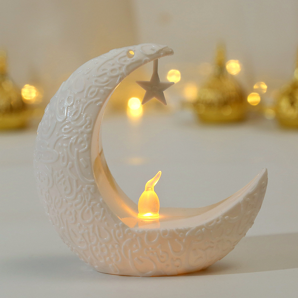 Close-up 3D embossed arabic scripture and hanging star ornament