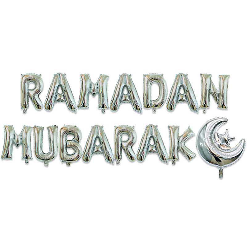 Ramadan Mubarak shiny silver foil letter balloon set with crescent star white background flat lay