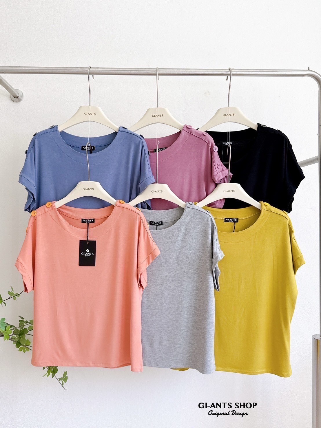 A109 Adorable shoulder buttons top