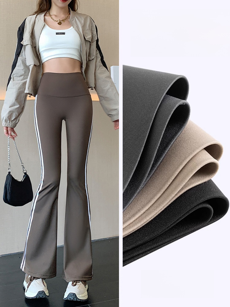 【🔥ล้ำเทรนด์ ไซต์กระชับพลิ้ว】กางเกงเลกกิ้งทรงขากระดิ่งลายทาง