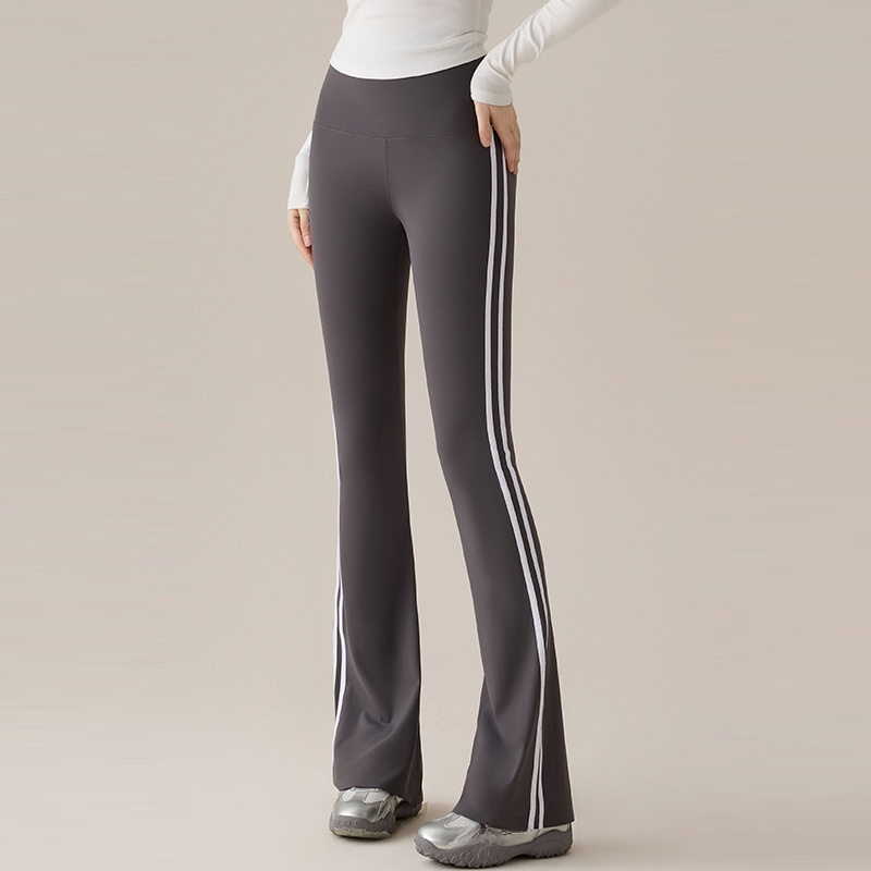 【🔥ล้ำเทรนด์ ไซต์กระชับพลิ้ว】กางเกงเลกกิ้งทรงขากระดิ่งลายทาง