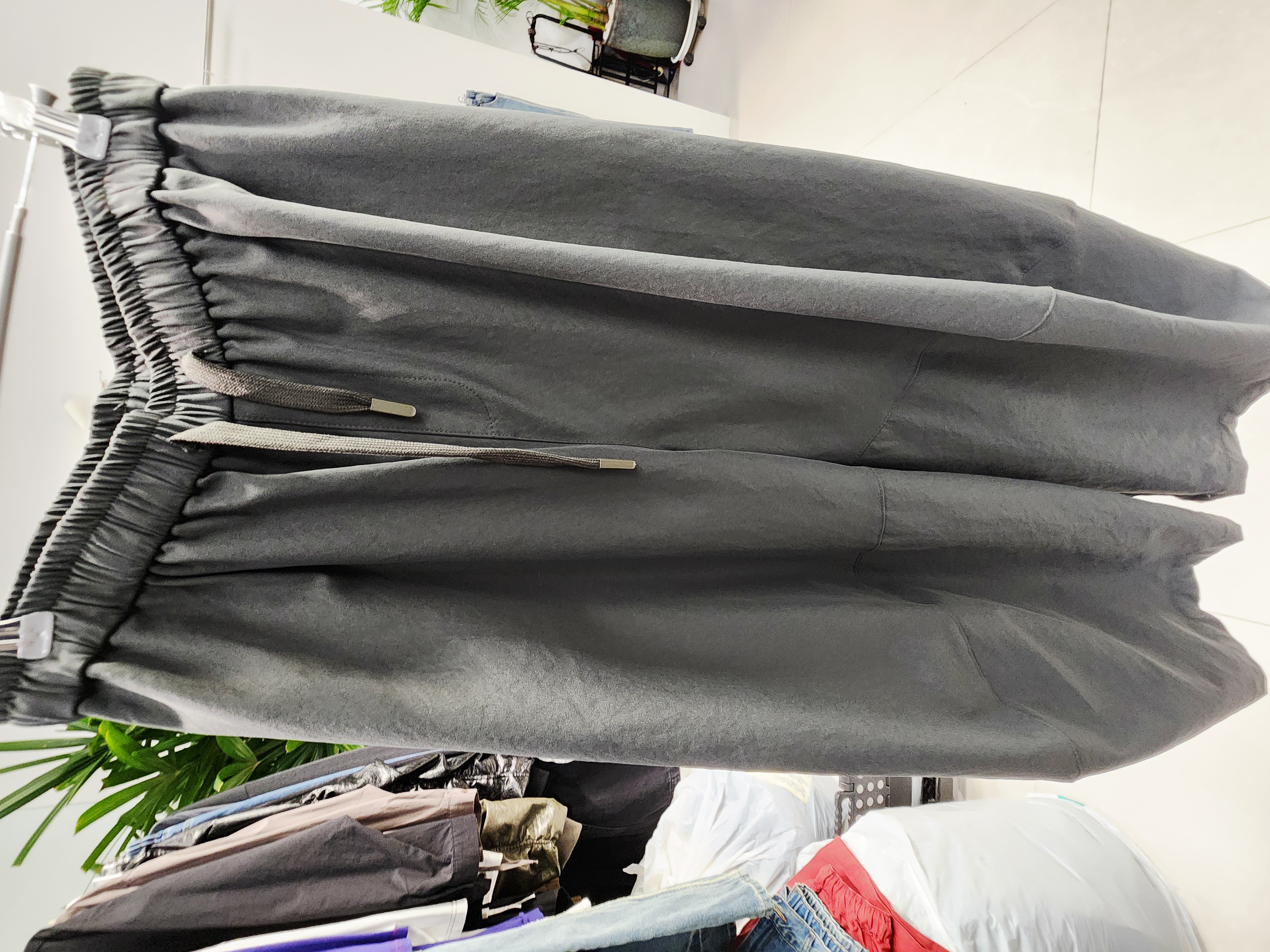 0901T GREY TROUSERS WITH DRAWSTRING WAIST AND CURVED PANELS