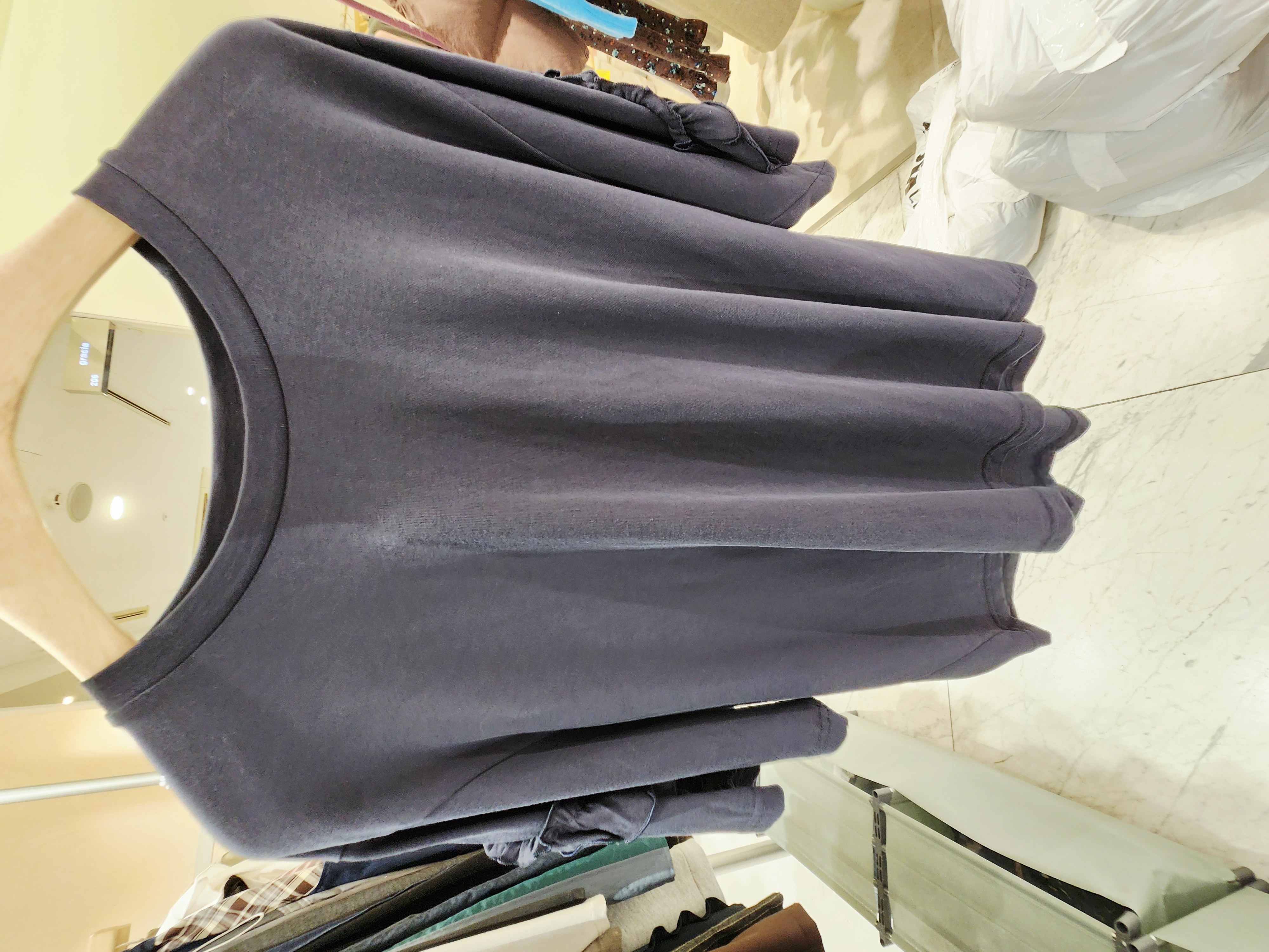 0983T NAVY TOP WITH RUFFLED SIDE TRIM AND ROUND NECKLINE