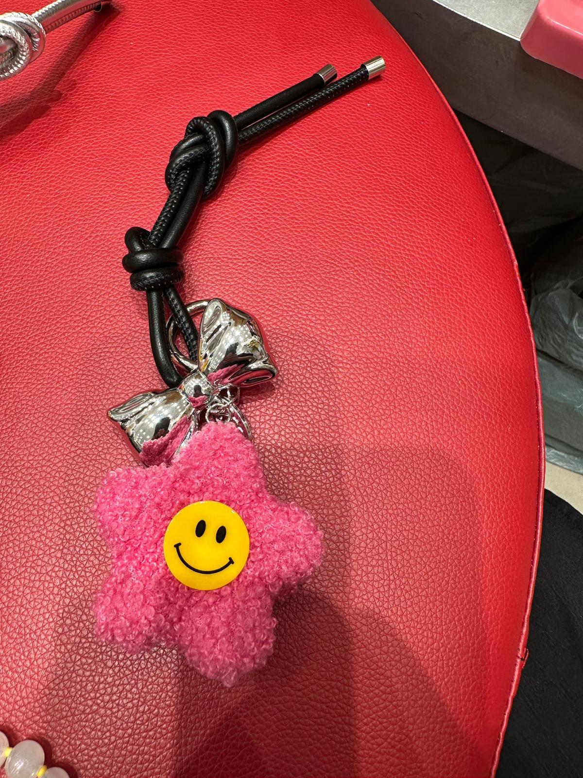 6881S PINK CASUAL FLOWER KEYCHAIN with SMILEY FACE CHARM