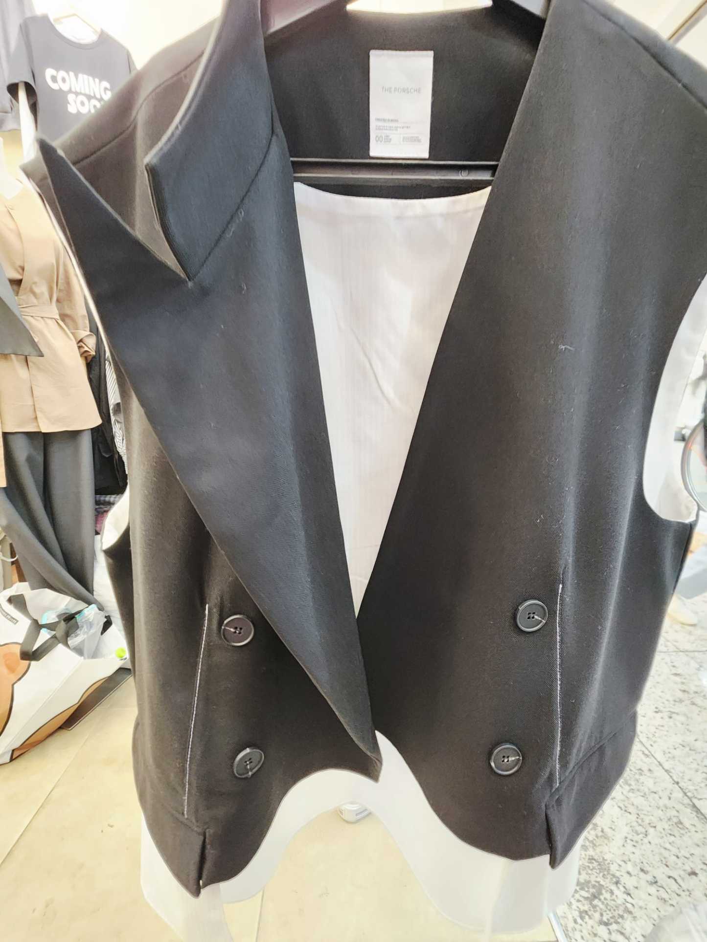 1108T BLACK VEST WITH WHITE TRIM DETAILS