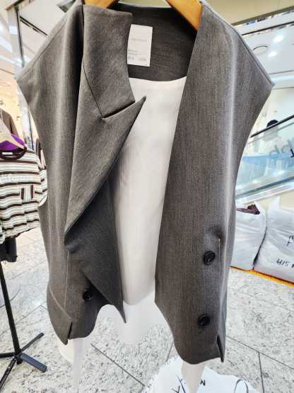1109T GREY VEST WITH WHITE TRIM DETAILS