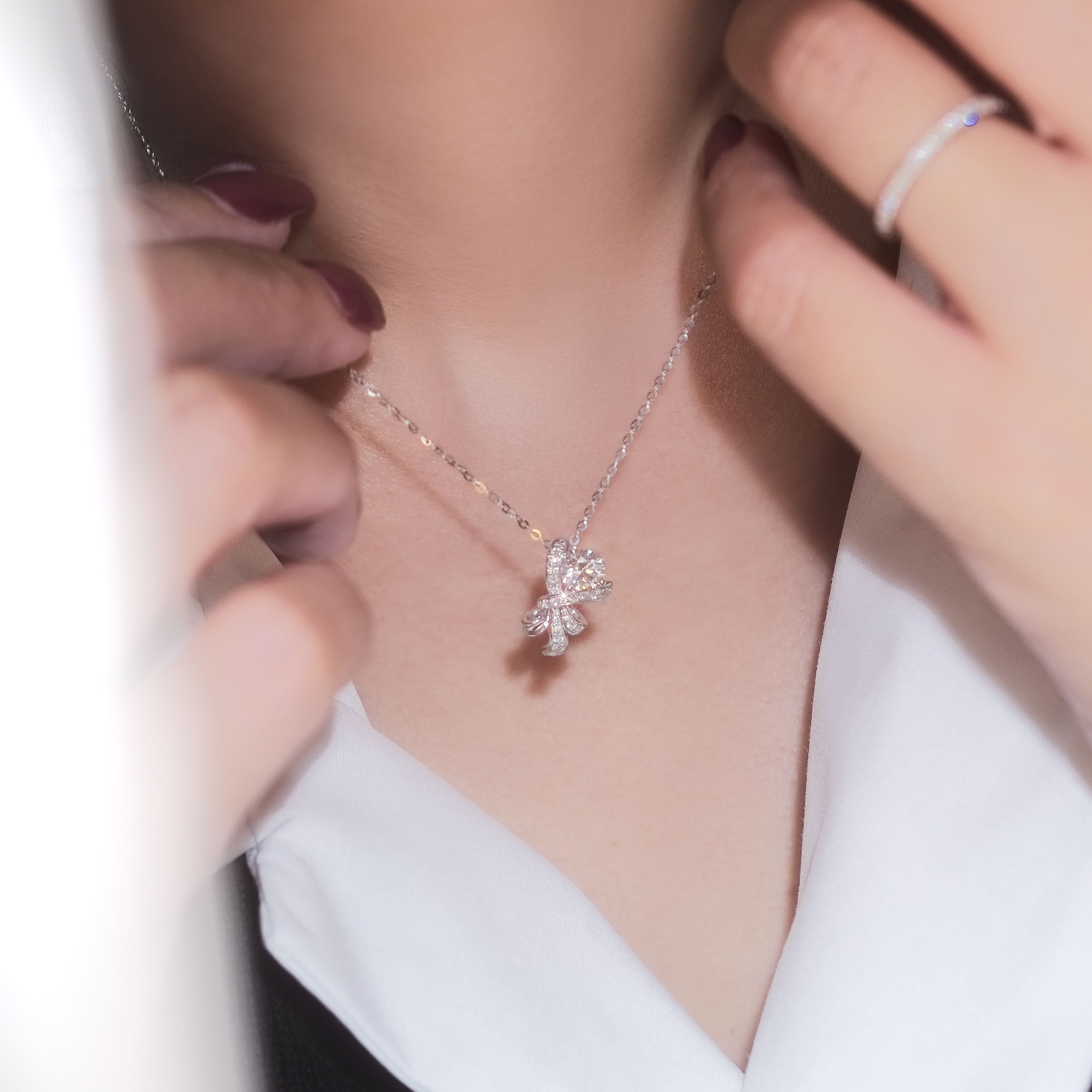 Model wearing 0.5ct Round Lab Grown Diamond Bouquet Style Pendant Necklace in 18K White Gold