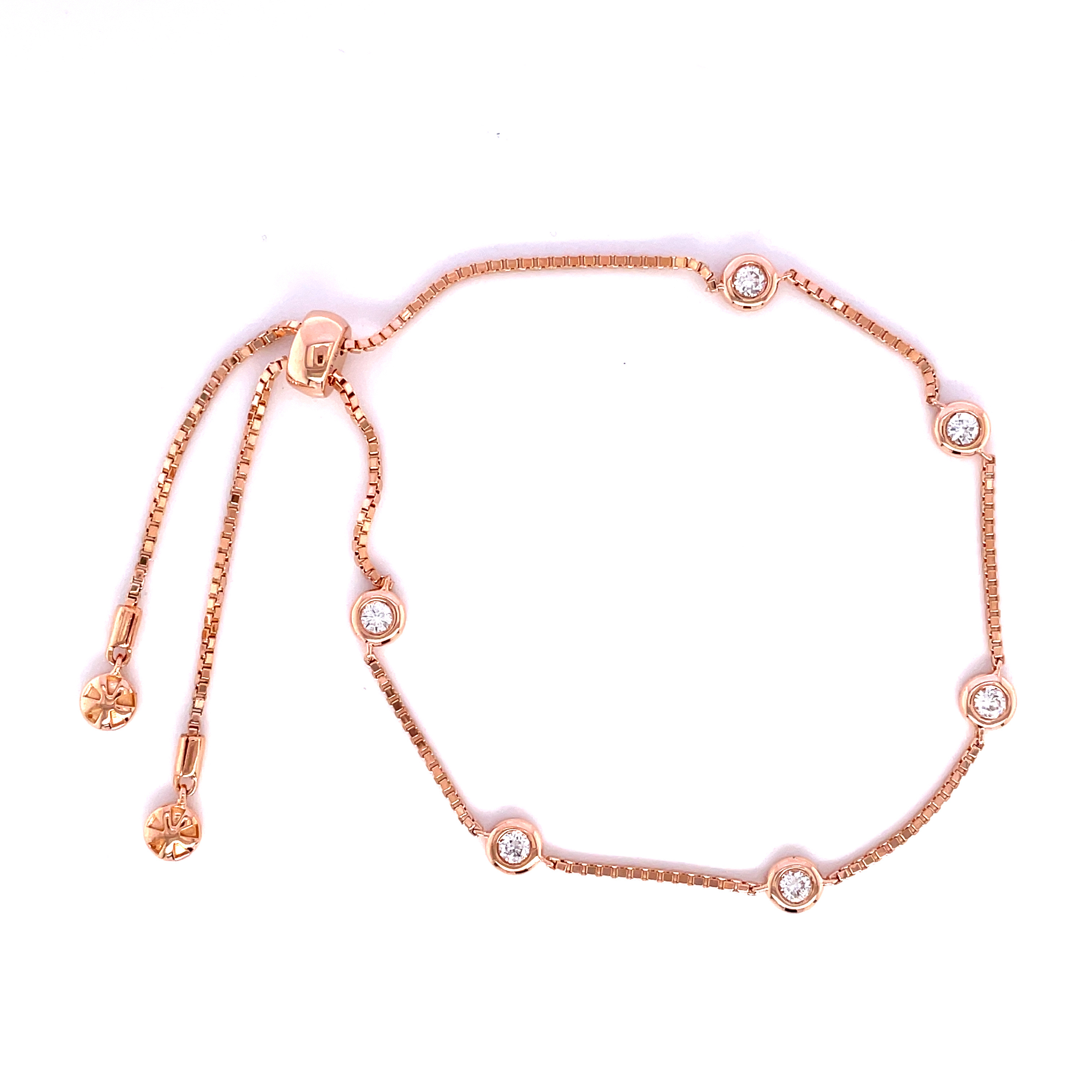 Rose gold diamond by the yard style bracelet featuring bezel set lab grown diamonds.
