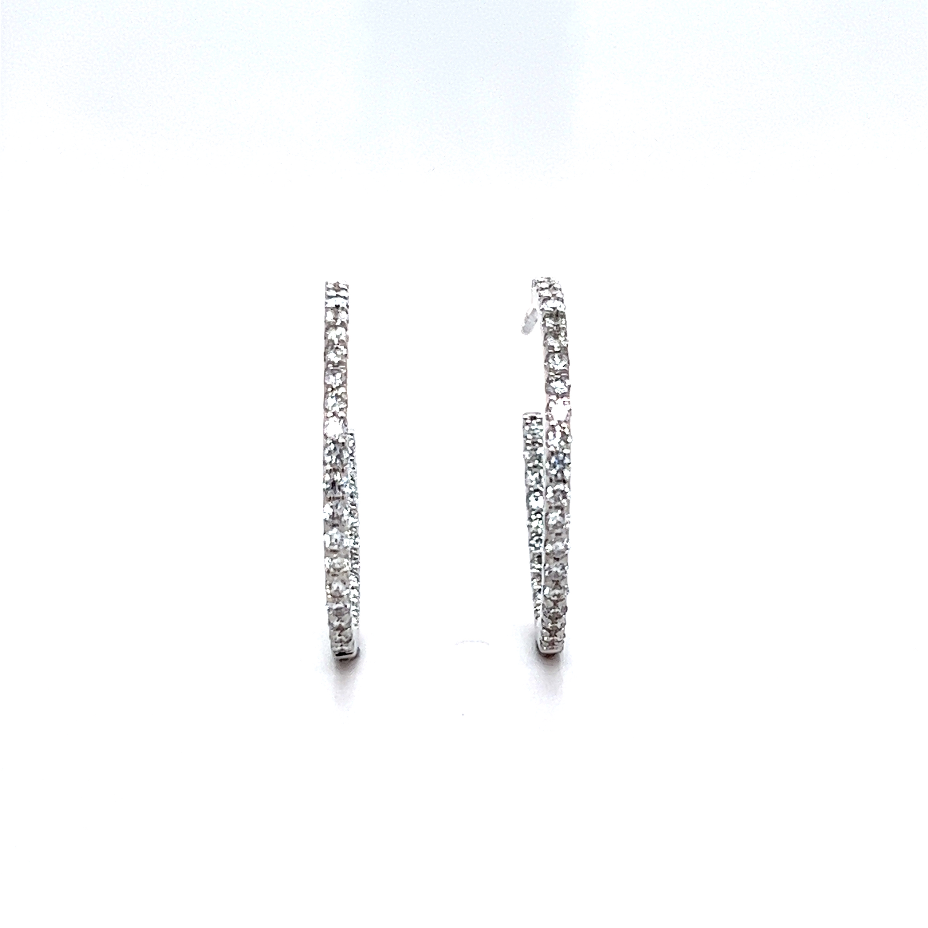 Inside-out lab grown diamond hoop earrings in 18k white gold, 0.62ctw.

