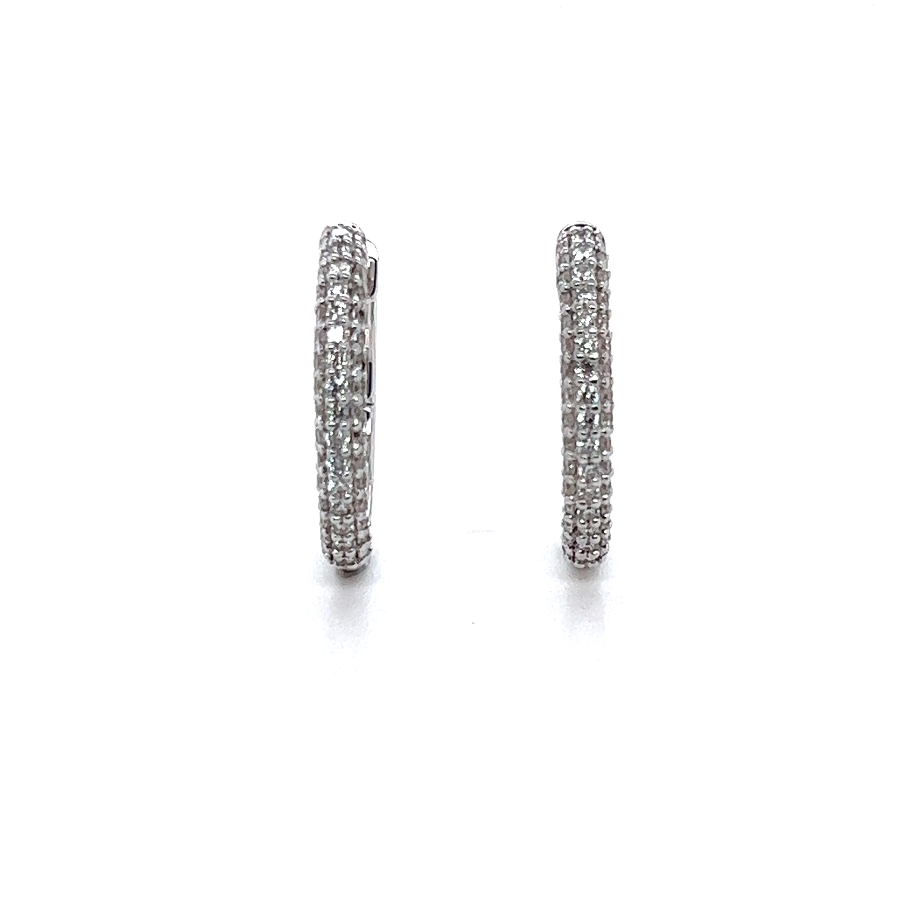 Front view of VVS clarity diamond pave hoops showing three rows of sparkle.