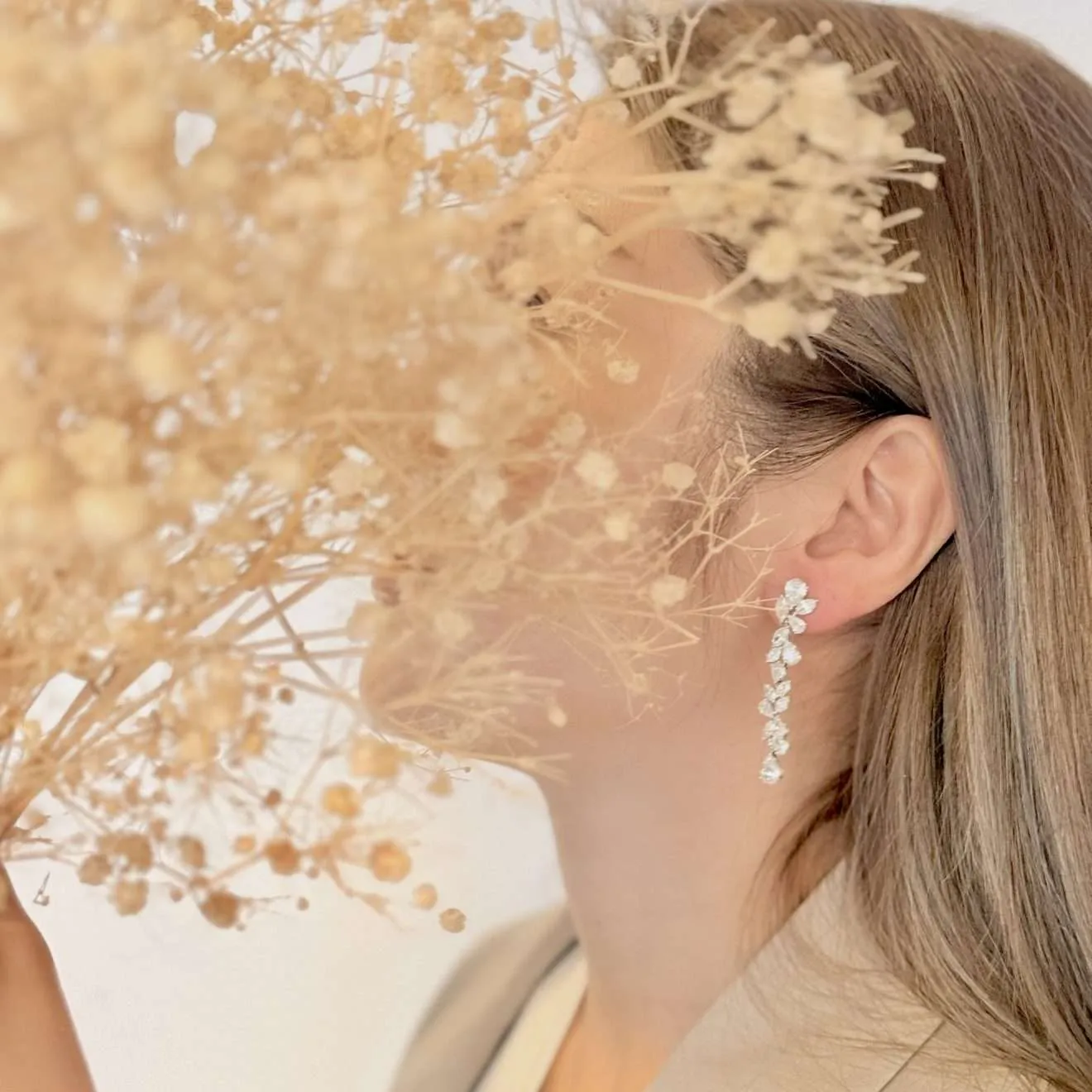 梨形及馬眼形培育鑽石垂墜耳環