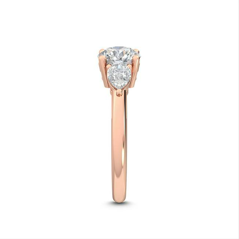 18k rose gold three stone setting ring detail