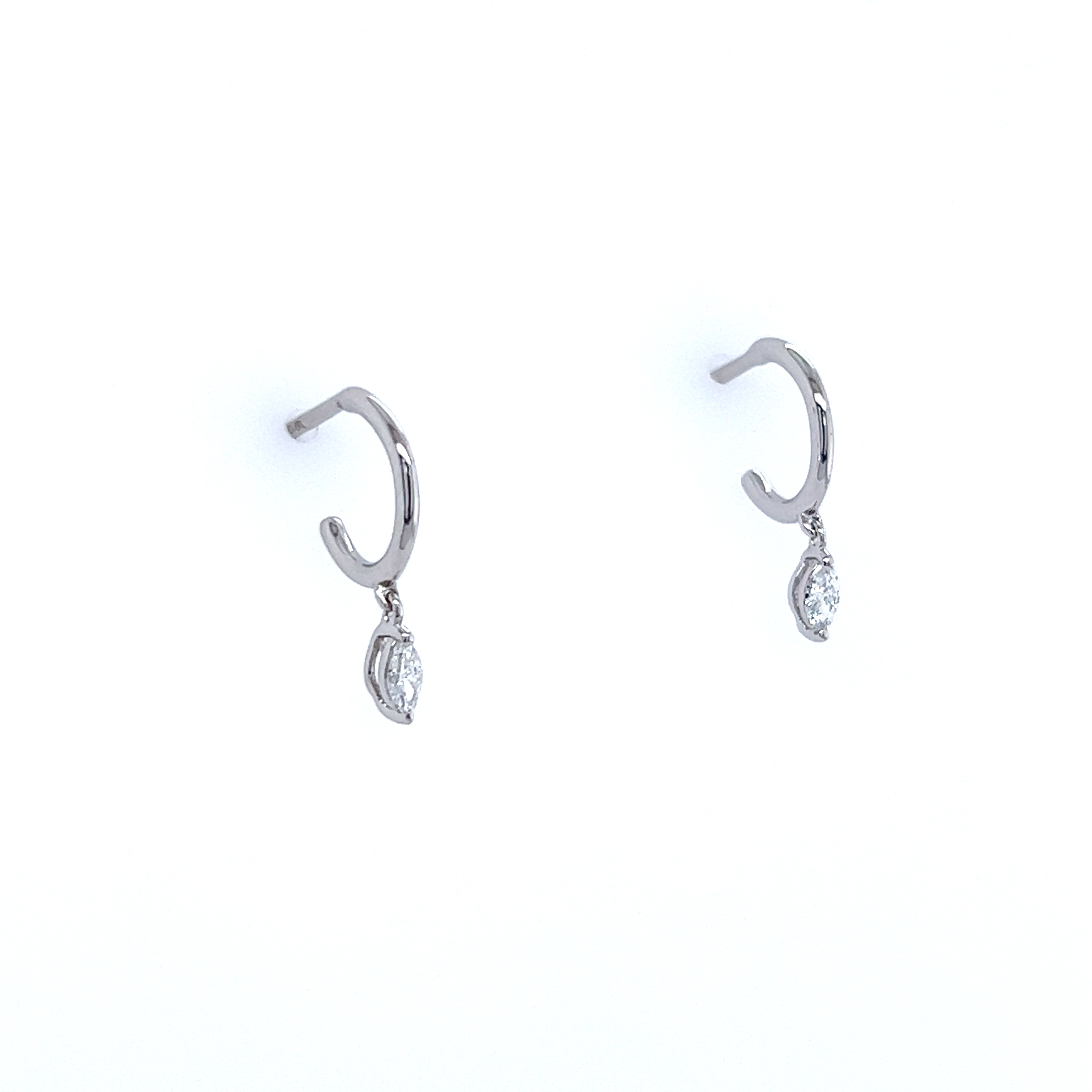 Side view of dainty marquise diamond drop earrings showing hoop detail.