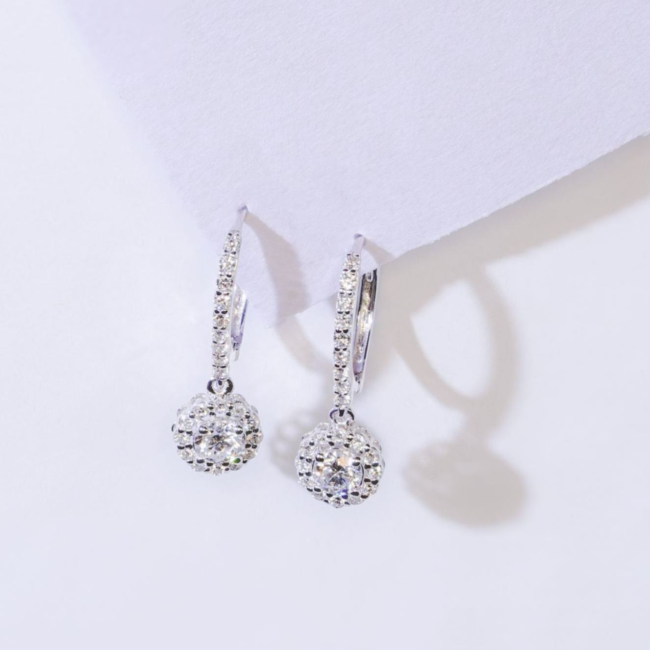 Sparkling halo lab grown diamond drop earrings in 18k white gold