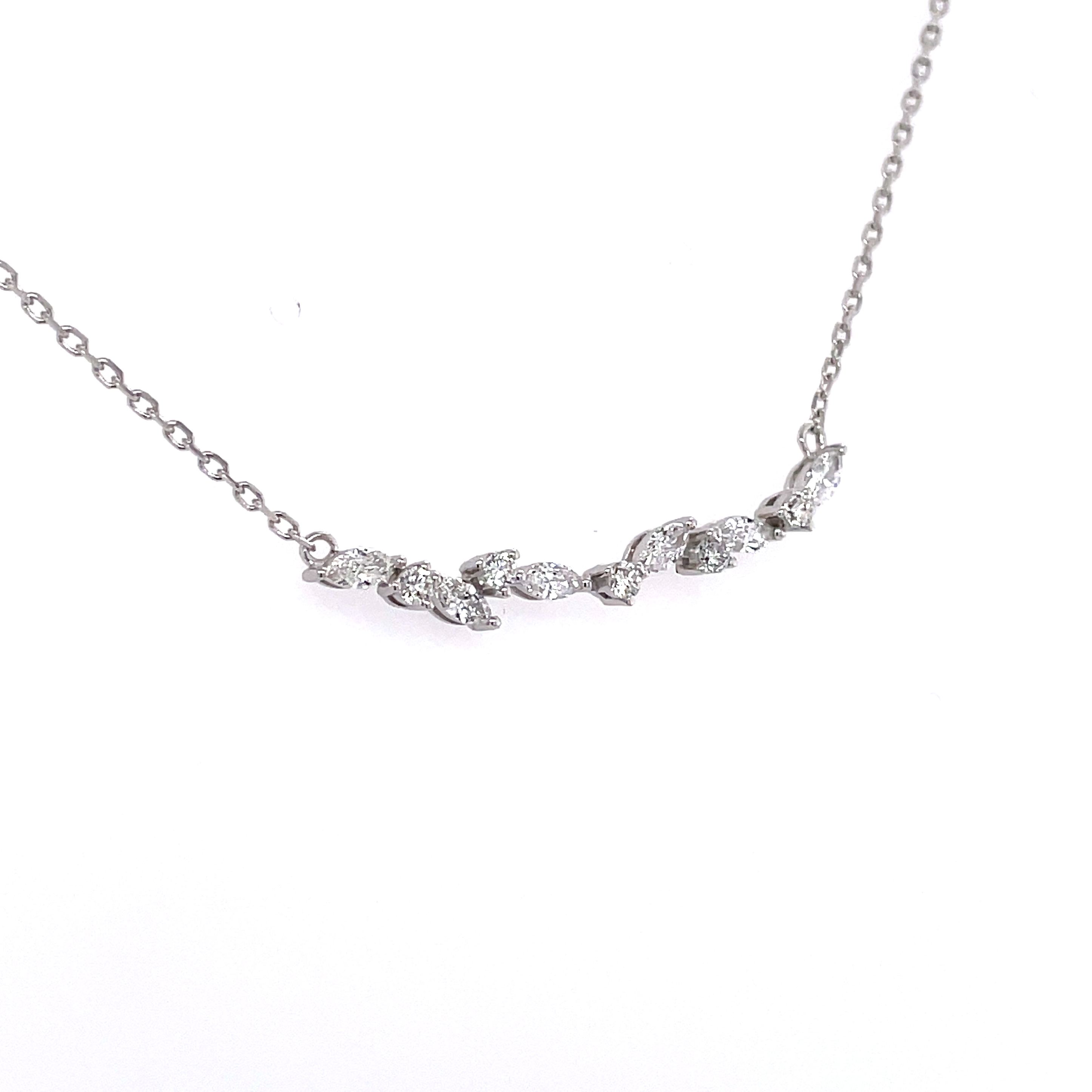 18k white gold curved smile necklace featuring alternating marquise and round diamonds.
