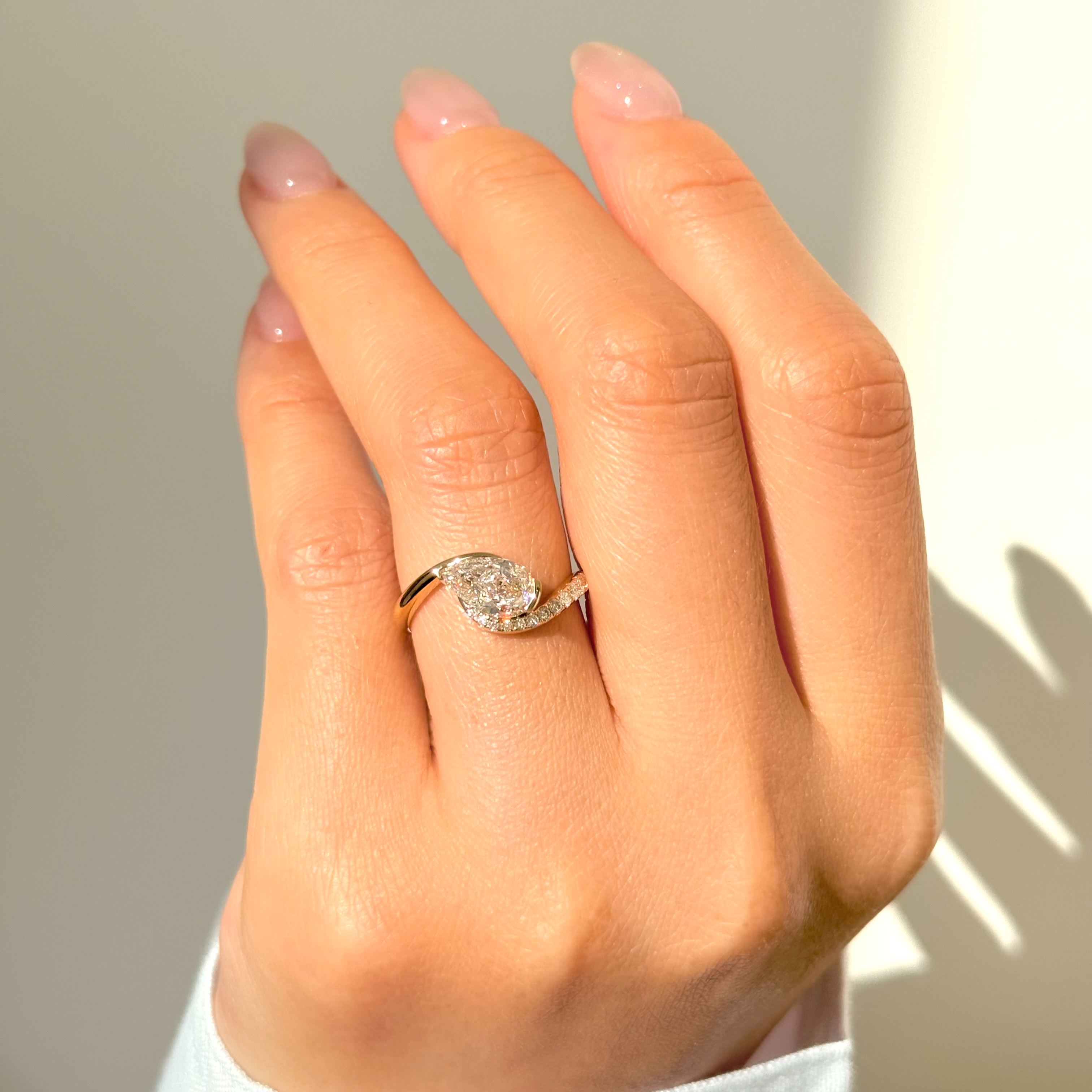 1.25ct E VS1 冰花切梨形培育鑽石18K黃金戒指