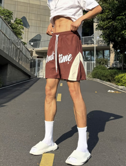 AT 四分短褲 華膚格運動短褲 美式潮流 交叉設計 寬鬆透氣 撞色