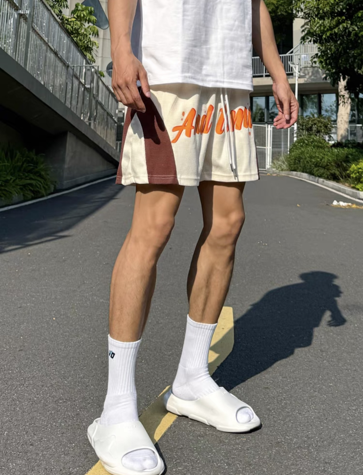 AT 四分短褲 華膚格運動短褲 美式潮流 交叉設計 寬鬆透氣 撞色
