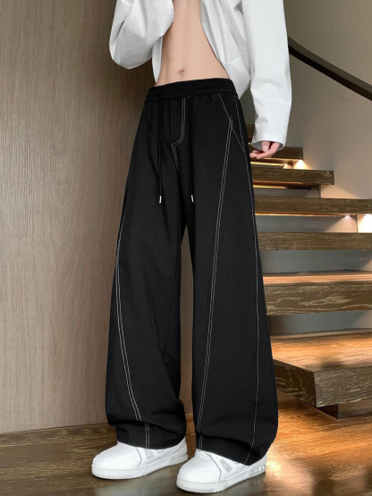 美式速乾運動長褲 鬆緊腰 彎刀線條設計 寬鬆垂順透氣