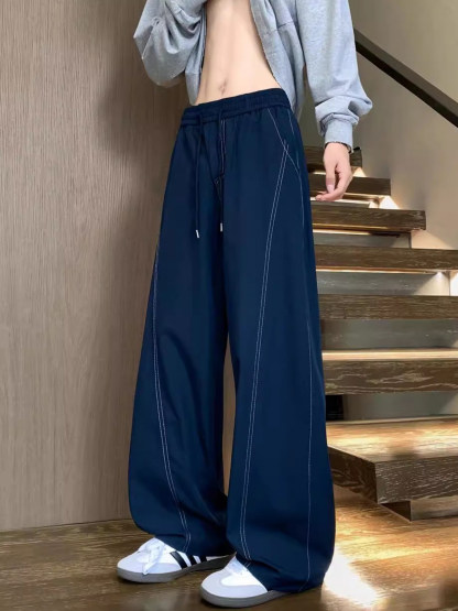 美式速乾運動長褲 鬆緊腰 彎刀線條設計 寬鬆垂順透氣