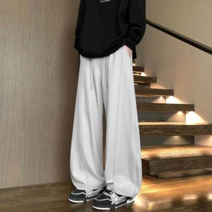 美式速乾運動長褲 鬆緊腰 彎刀線條設計 寬鬆垂順透氣