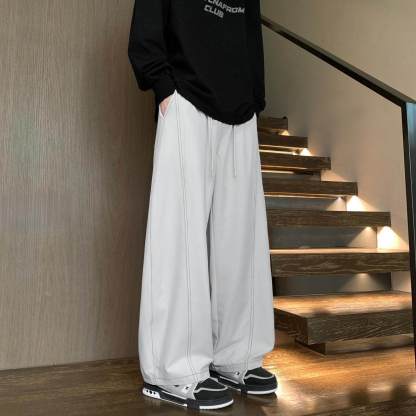 美式速乾運動長褲 鬆緊腰 彎刀線條設計 寬鬆垂順透氣