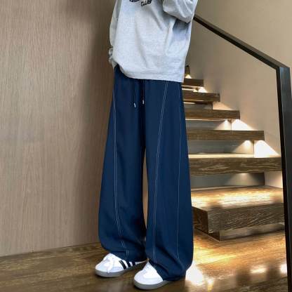 美式速乾運動長褲 鬆緊腰 彎刀線條設計 寬鬆垂順透氣