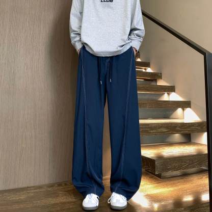 美式速乾運動長褲 鬆緊腰 彎刀線條設計 寬鬆垂順透氣