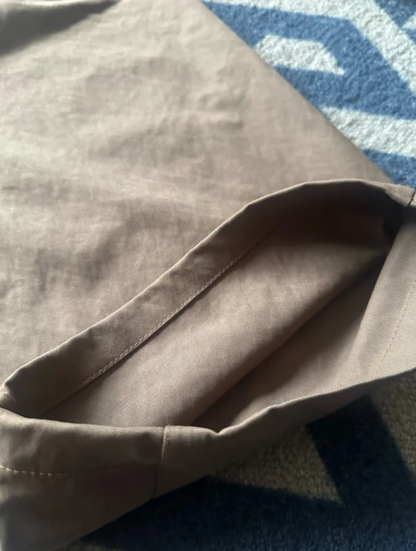 HT 涼感打褶彎刀長褲 寬鬆直筒設計 遮肉顯瘦百搭