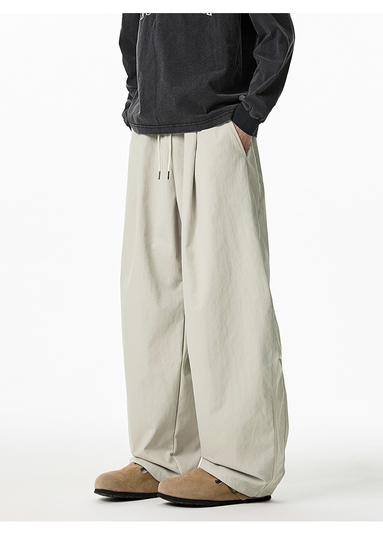 HT 涼感打褶彎刀長褲 寬鬆直筒設計 遮肉顯瘦百搭