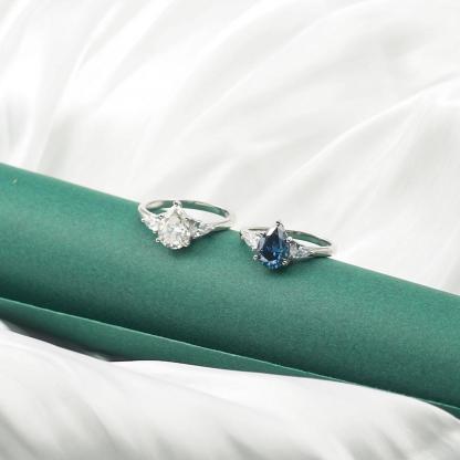 2ct Pear Synthetic Moissanite Three Stones Ring In 925 Sterling Silver