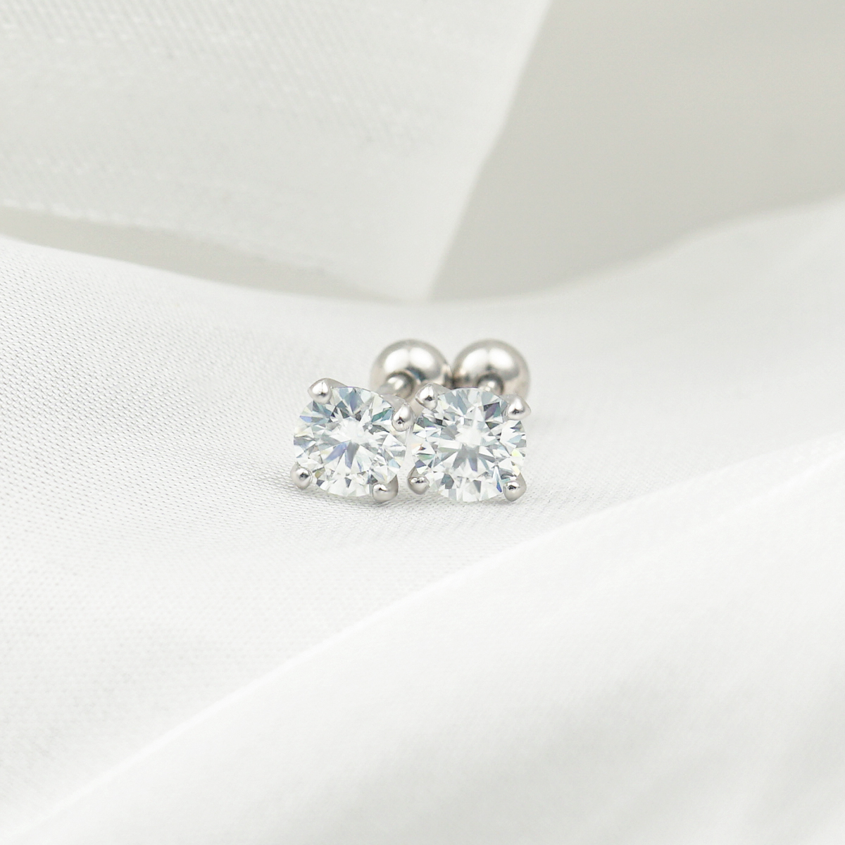 0.3ct Round Synthetic Moissanite Four Prong Stud Earrings S925