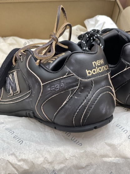 MiuMiu x NB530系列 “黑皮”男女同款