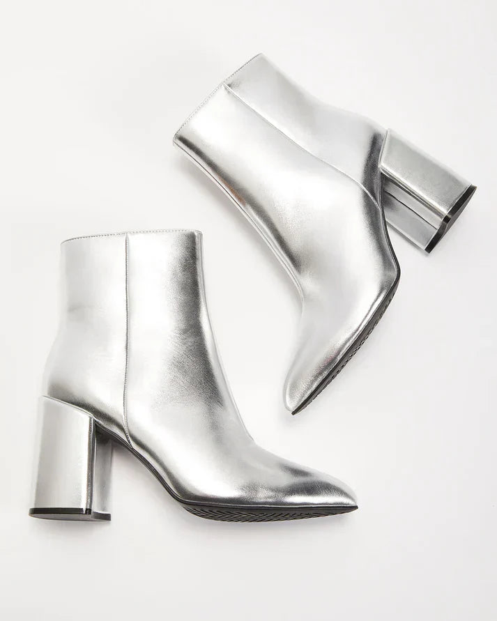 Silver metallic block heel ankle boots for a bold and trendy look