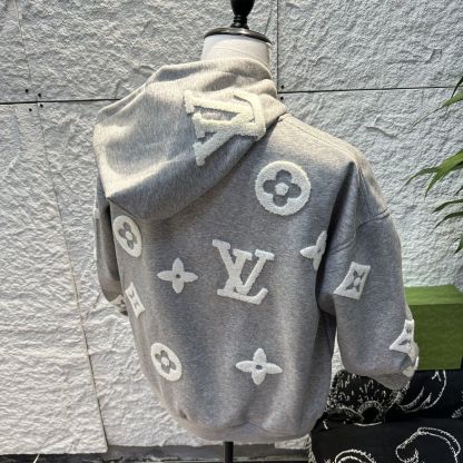 通気性と汎用性に優れた、男女兼用の新しいファッションフード付きカーディガンニットセーター