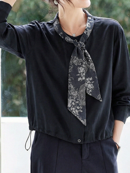 ゆったりデザイン性のあるボウタイ付きシャツジャケット